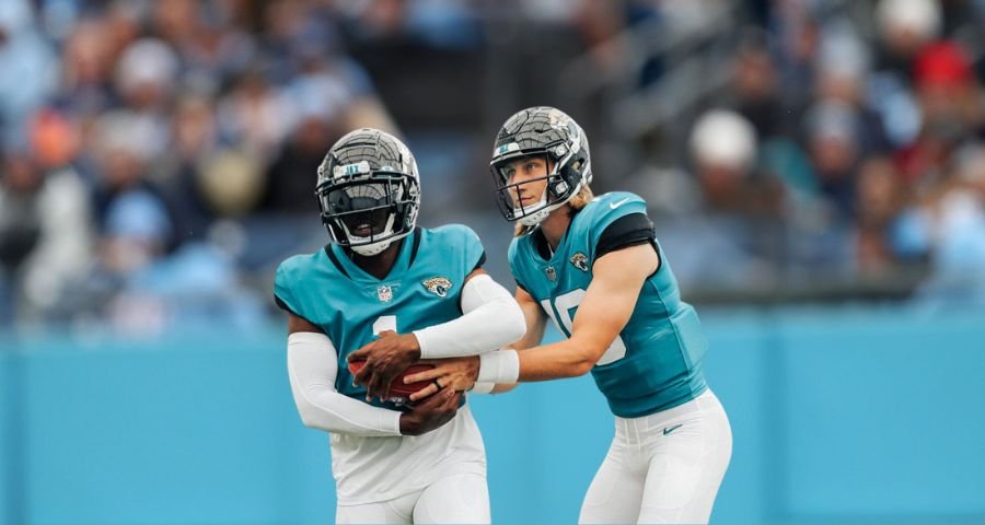 Jaguars QB Trevor Lawrence and RB Travis Etienne Jr. in Uniform